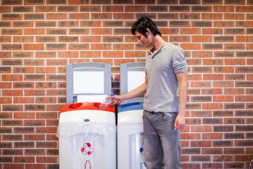 Workers using PPE during a final stage of office clearance